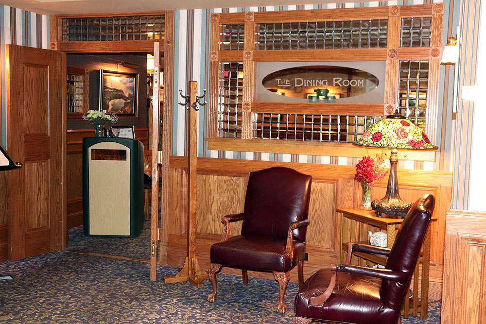 A sitting area in the lobby of The Pollard Hotel for relaxation.