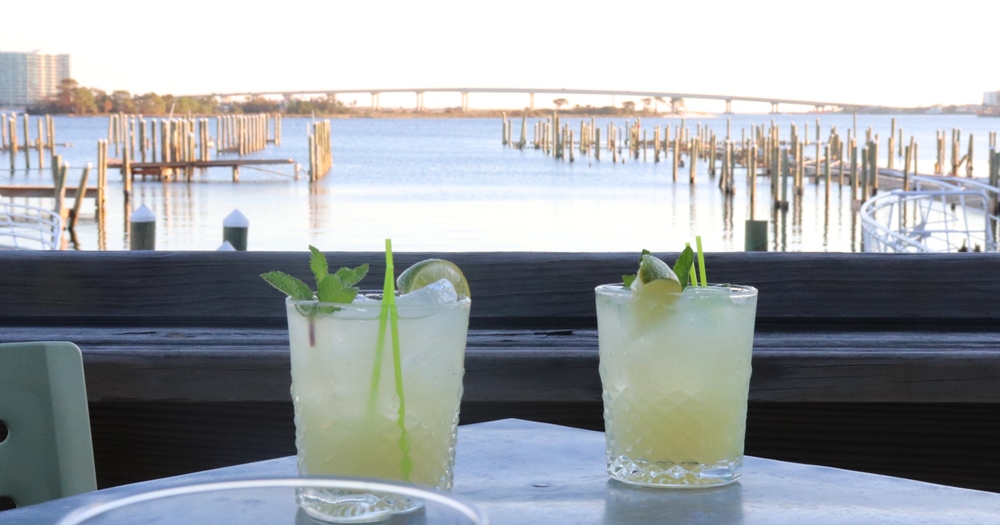 Enjoy cocktails overlooking the bay from Playa at Sportsman Marina